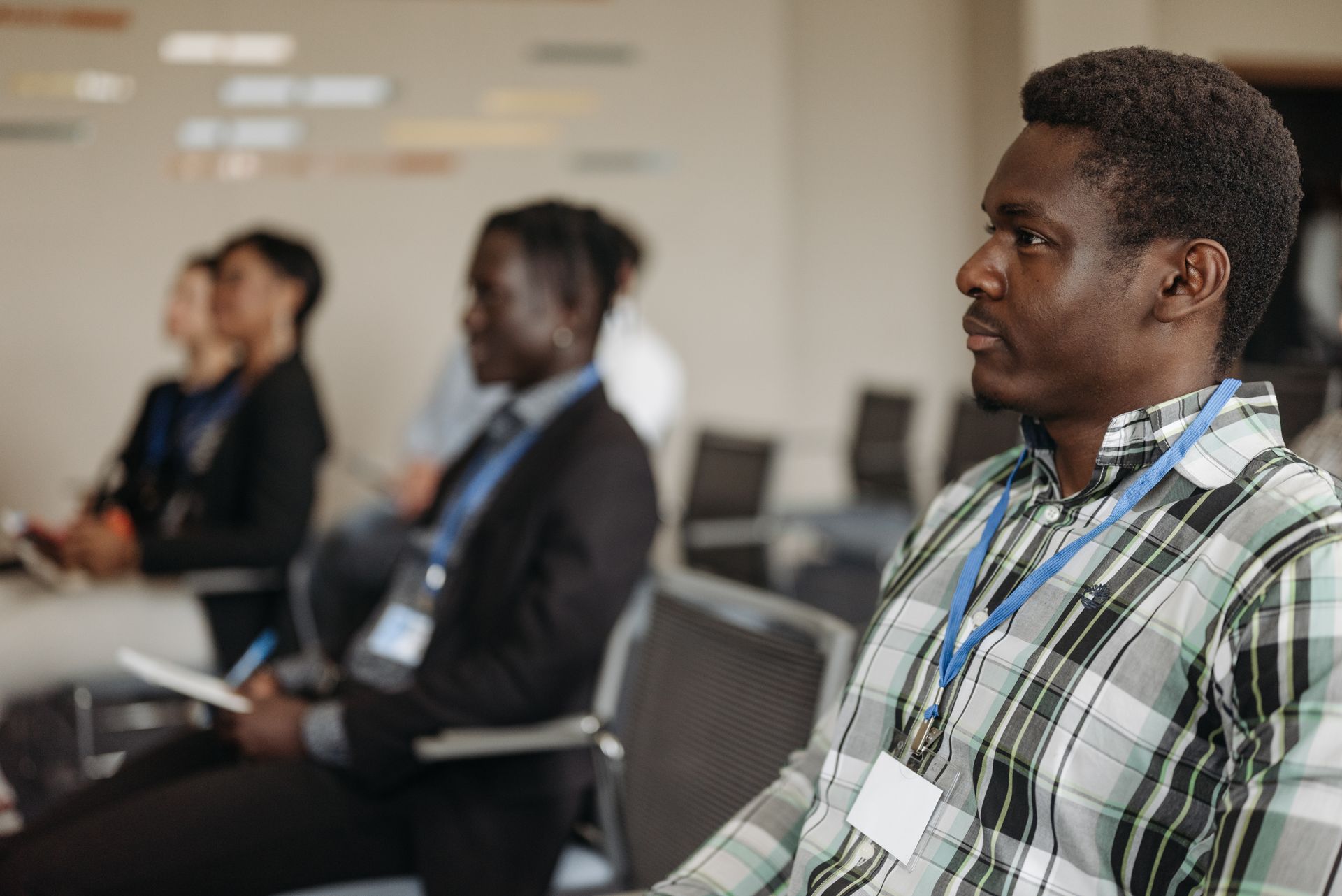 Participants listening at a workshop